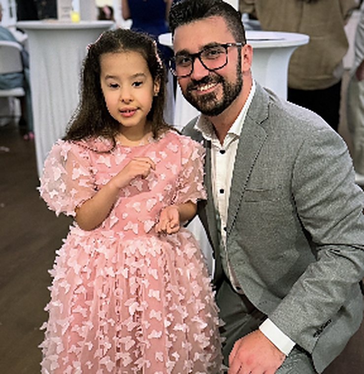 Christopher Papallo with a young guest at a TPFF fundraiser