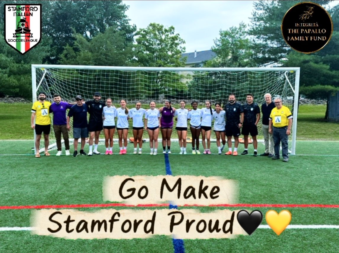 The Stamford FC 2013 Girls team with coaches and TPFF supporters at the goal